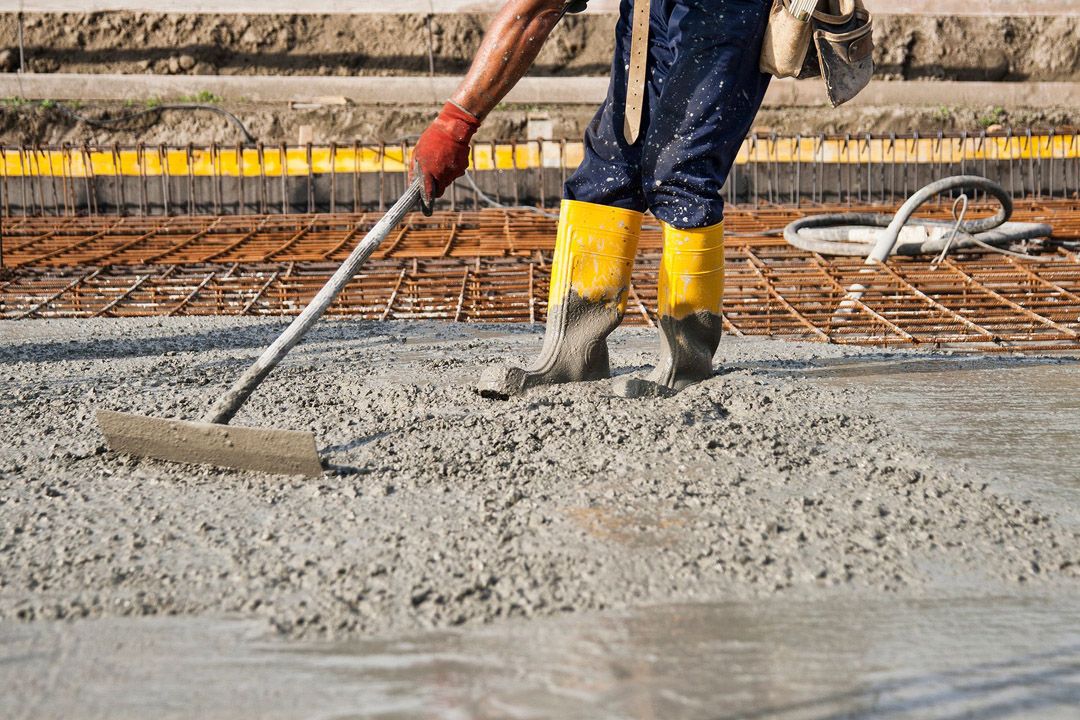 a-bricklayer-who-level-the-freshly-poured-concrete-2021-08-27-14-49-45-utc-2880w.jpg