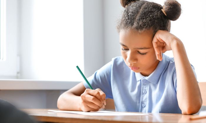 young girl studying