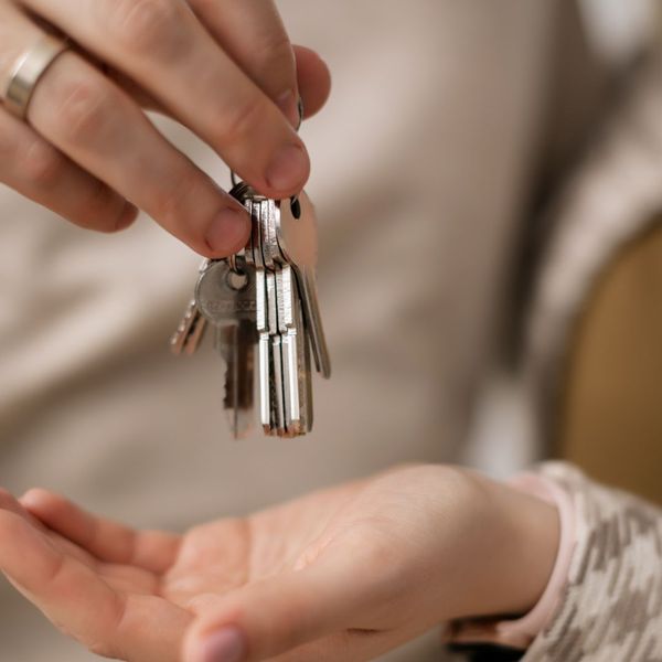 person holding keys