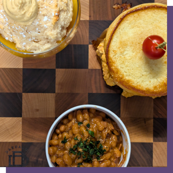 assorted foods on a checkered cutting board