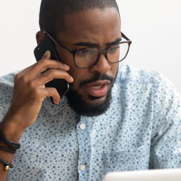 a man is making a phone call