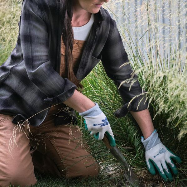 a woman landscaping Guide to a Strong Rodent Perimeter Defense (3).jpg