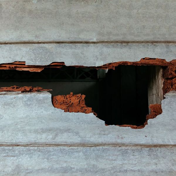 hole in wood wall