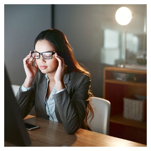 stressed at computer desk