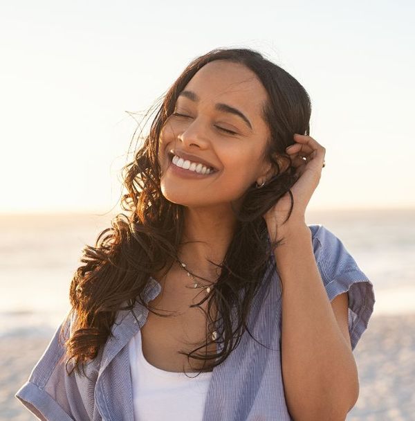 Happy woman on the beach