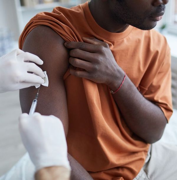 A man receiving a vaccination