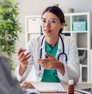 Doctor speaking with a patient about how to detox