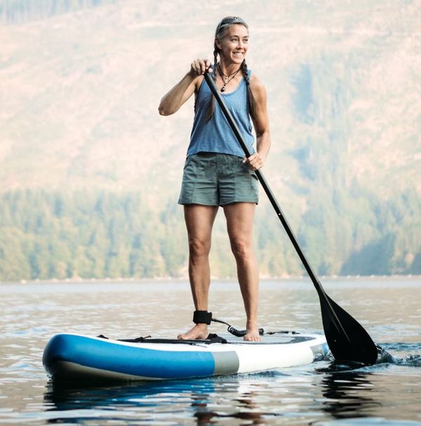 A woman enjoying a paddleboard ride