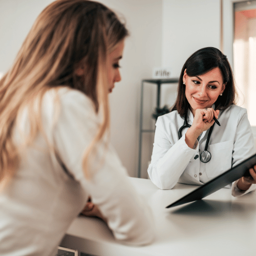 Patient discussing an IV therapy plan with a Regen Wellness provider in Dallas