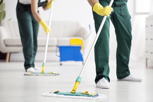 Cleaning Crew Mopping Floor
