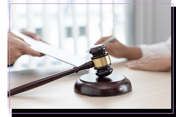 gavel and paperwork gavel and paperwork