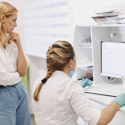 nurse using a computer nurse using a computer