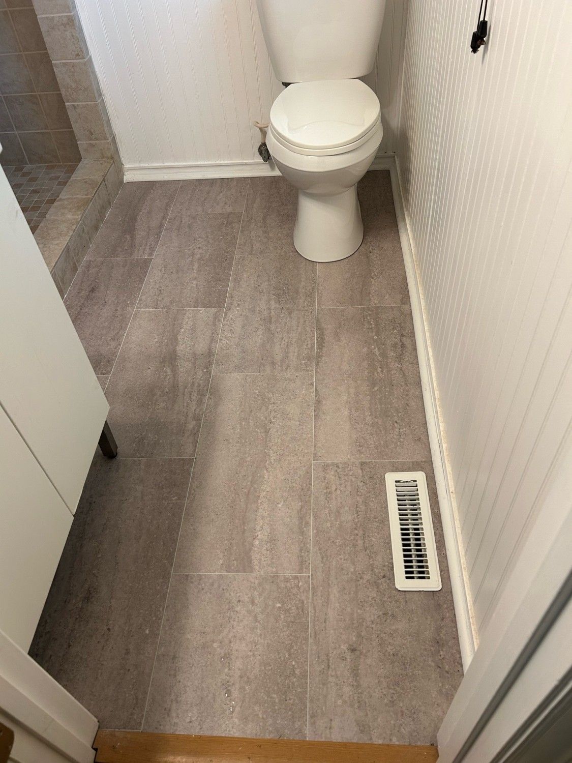 Bathroom after new floor.jpg