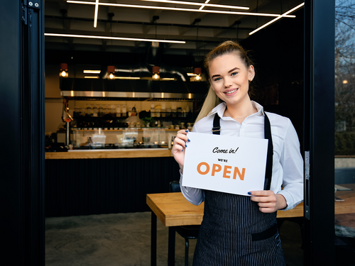 Small business owner opening their restaurant.