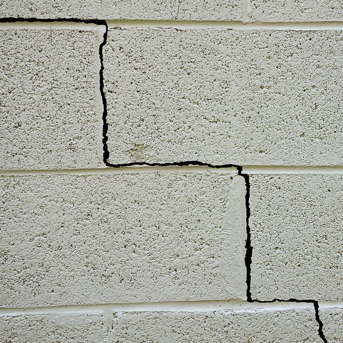 White bricks with large crack through them