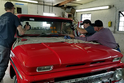 putting windshield on truck