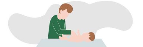 Newborn on table