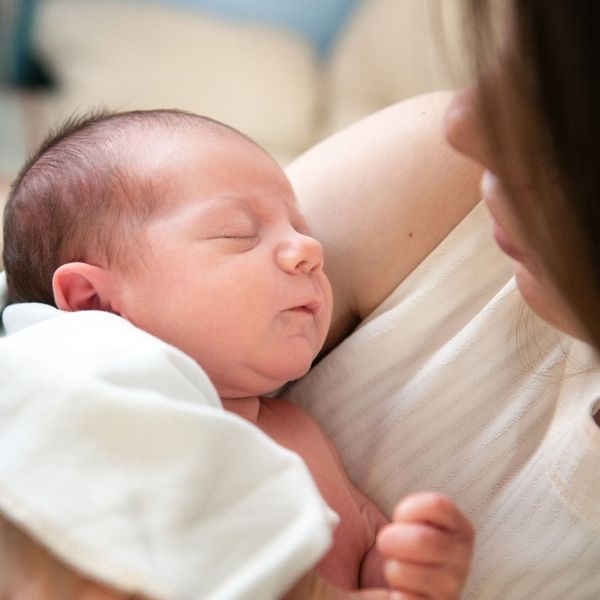 closeup of a mother holding a newborn