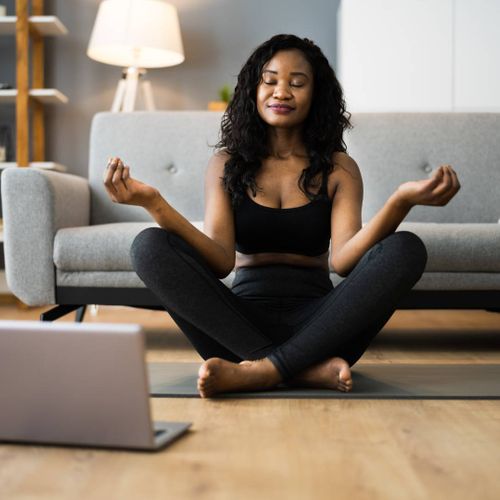 woman doing yoga on the floor