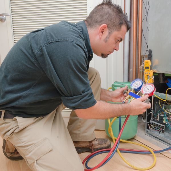 HVAC tech fixing unit