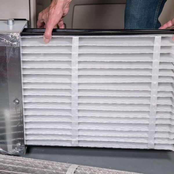 a filter being replaced The Top Reasons Your Furnace Needs Professional Repair This Winter (3).jpg