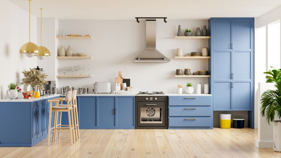 finished kitchen with blue cabinets 