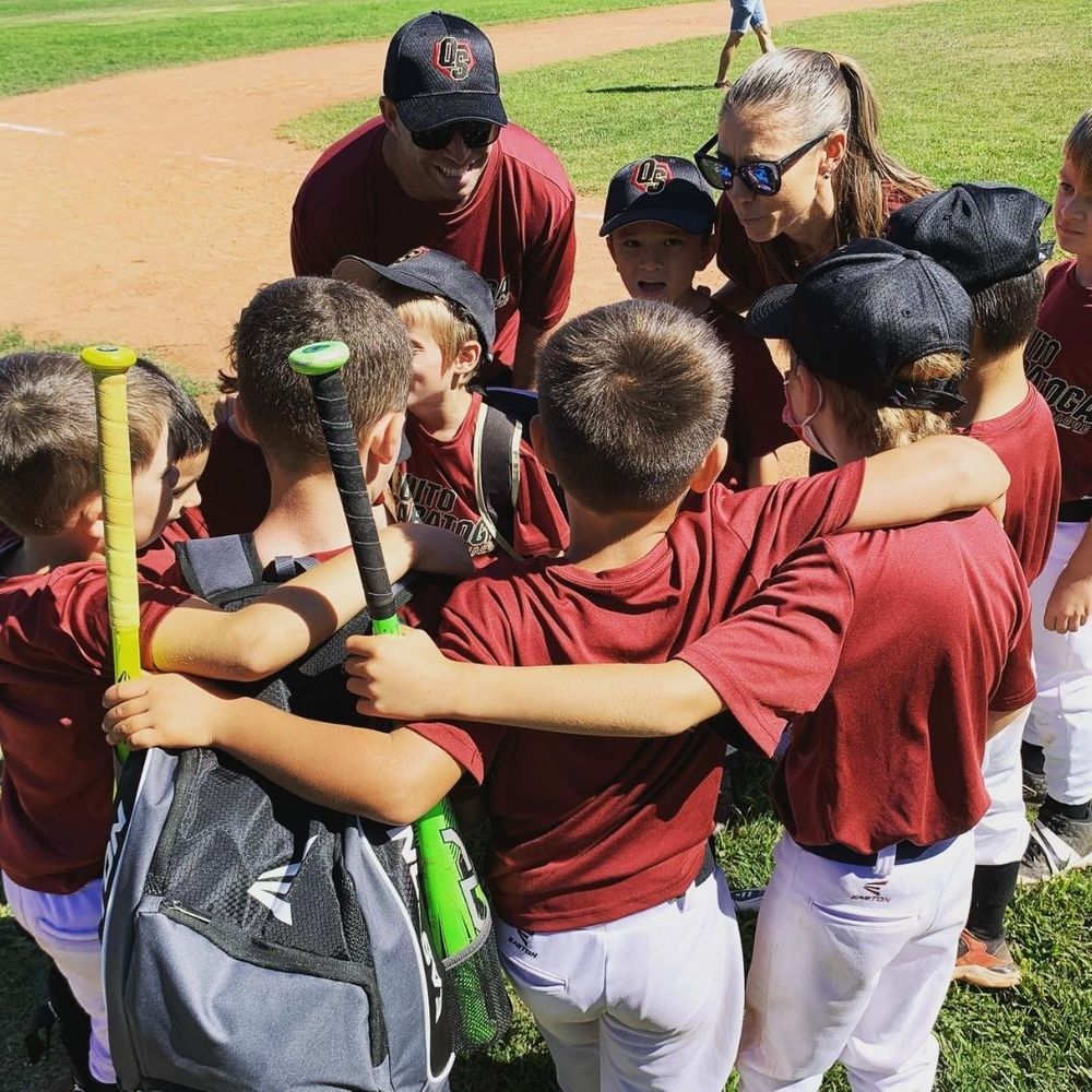 A team huddle with a little league