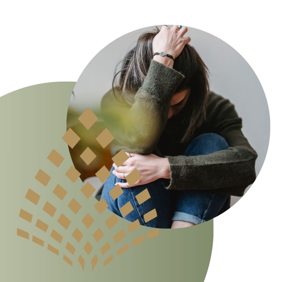 Woman with her head in her hands