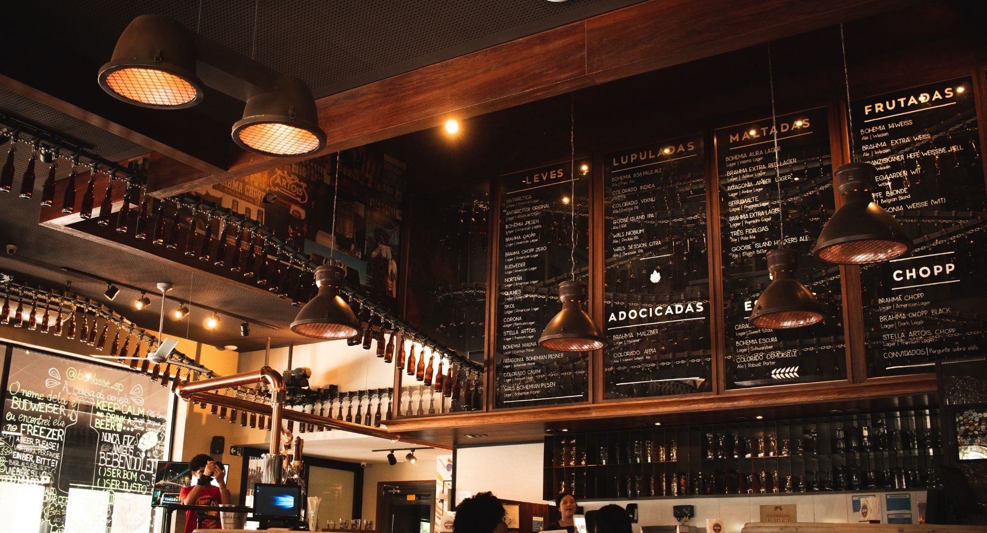 food menu on chalkboards in inviting restaurant 