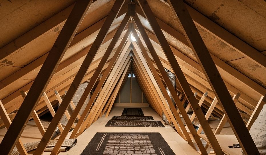 attic with metal roof trusses 
