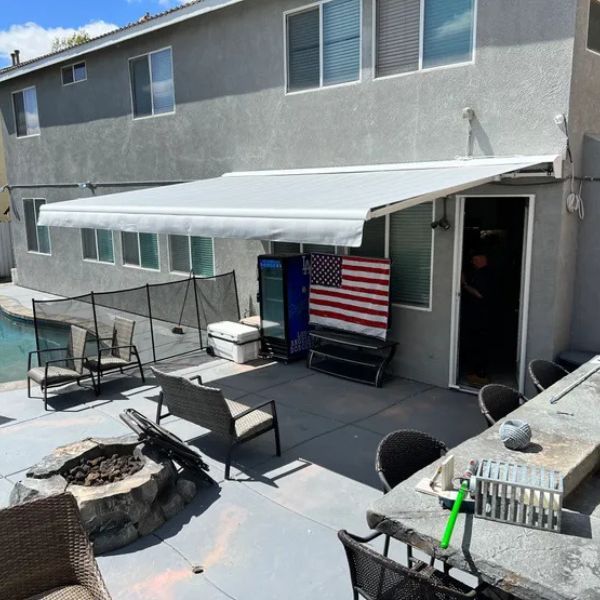 Retractable awning over backyard