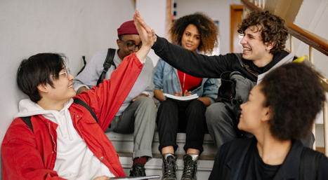 high school kids giving high fives