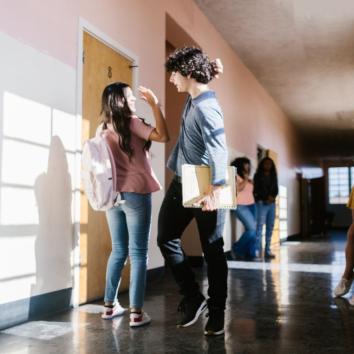 high school kids giving high fives