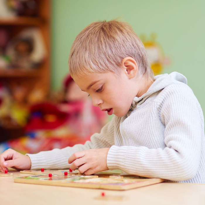 child playing puzzle game