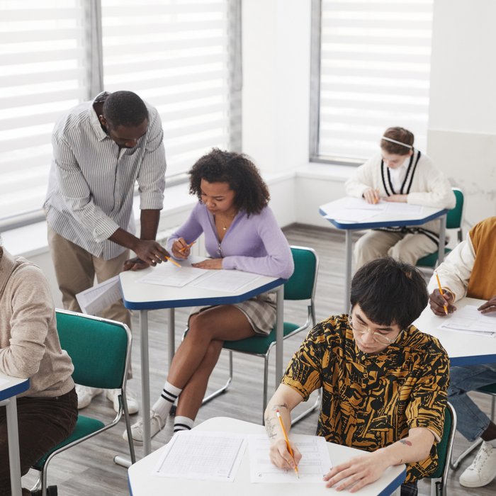 children in a classroom learning. 