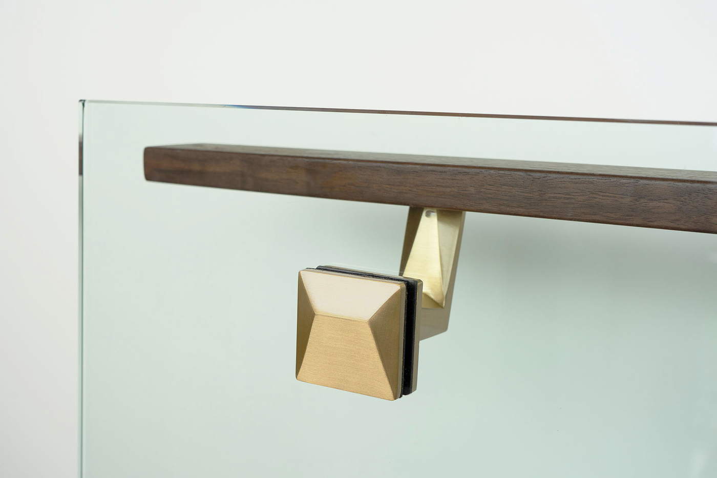 Contemporary-glass-mounted-brass-handrail-bracket