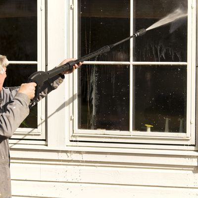 1080x1080Social-2 man cleaning windows of a building.jpg