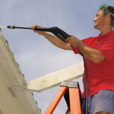 1080x1080Social-1 man washing off a roof.jpg