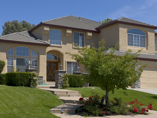 a beautiful home with nice landscaping