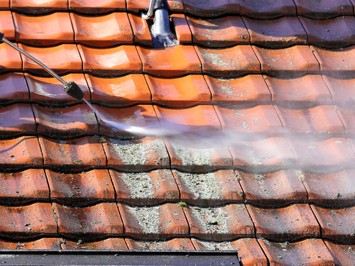 Pressure washing a roof