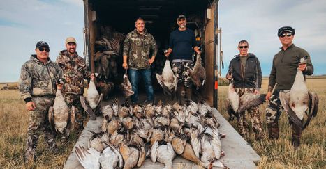 group of guys with products from their hunt