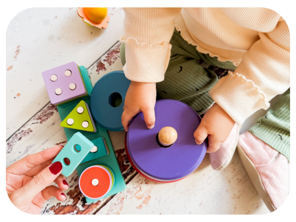 toddler playing with toys