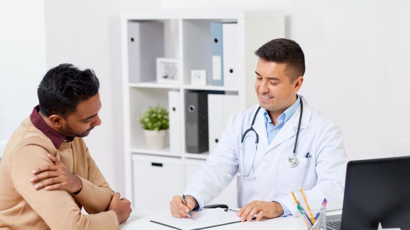 Doctor and patient talking
