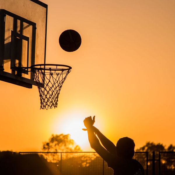 man playing basketball