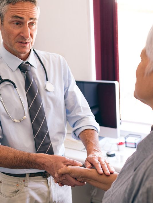 A patient with hypertension, a patient being seen by a doctor