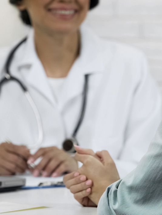 An image of a doctor talking to a patient