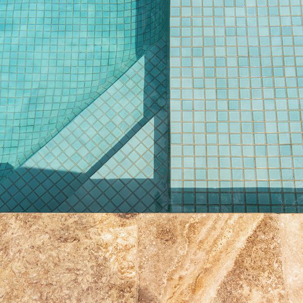 Decorative concrete at the edge of a swimming pool