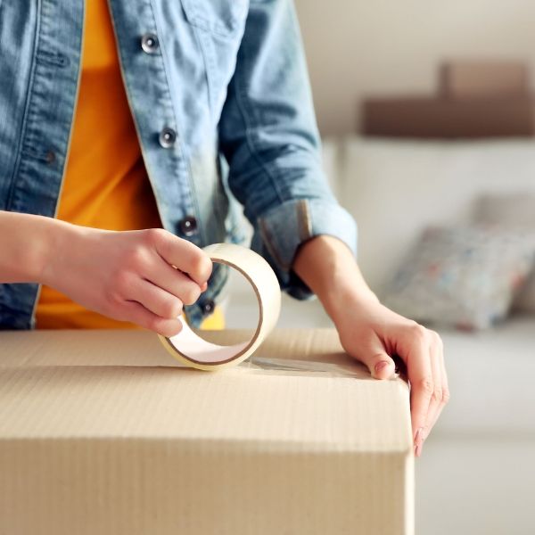 image of a woman packing up