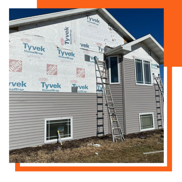 siding being installed on home