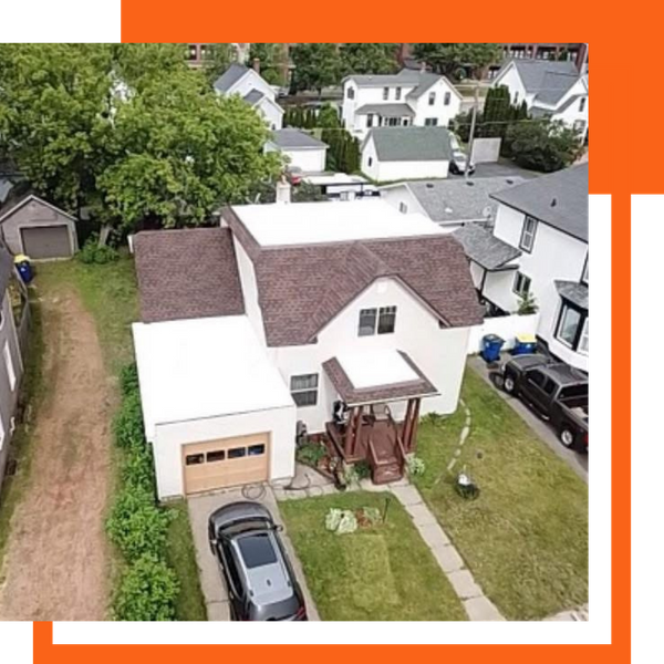 An arial view of a house with a roof